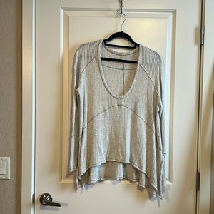 Free People oversized raw hem thermal top